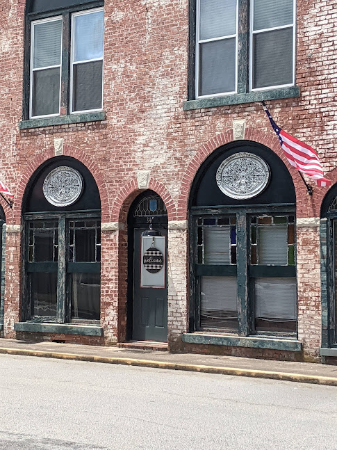 old Victorian storefront converted to apartment